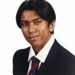 School portrait of a young man in a suit jacket and tie.